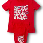 A red t-shirt and shorts set with the words protect your peace on it.