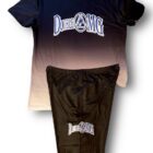 A black and white shirt with the words " drum magic ".