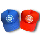 Two hats are shown side by side, one red and the other blue.